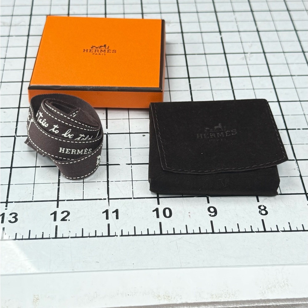 Hermes Orange and Black Storage Box. 3 by 3 inches, ribbon, brown pouch. - Picture 3 of 7